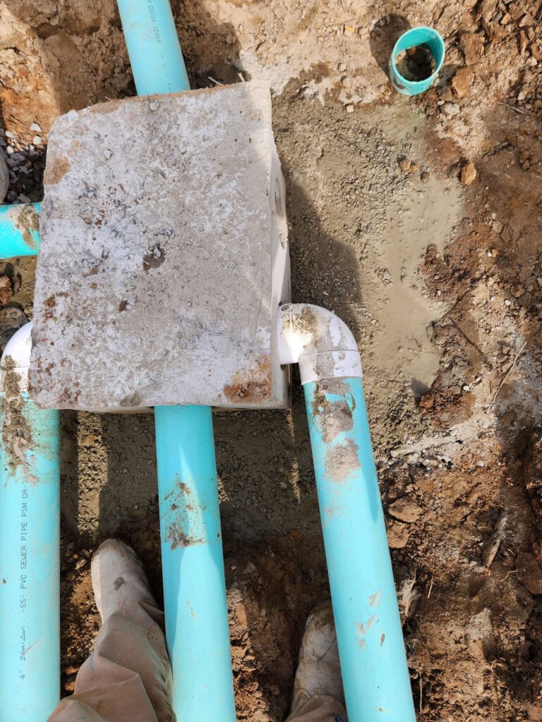 Sewer line connections and a tank lid during line work, Carolina Septic, CSRA