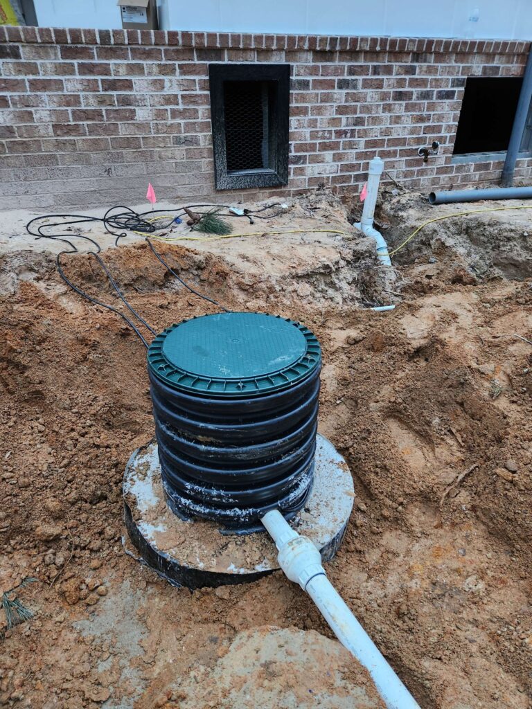 Access riser and lid at a finished house, Carolina Septic, CSRA